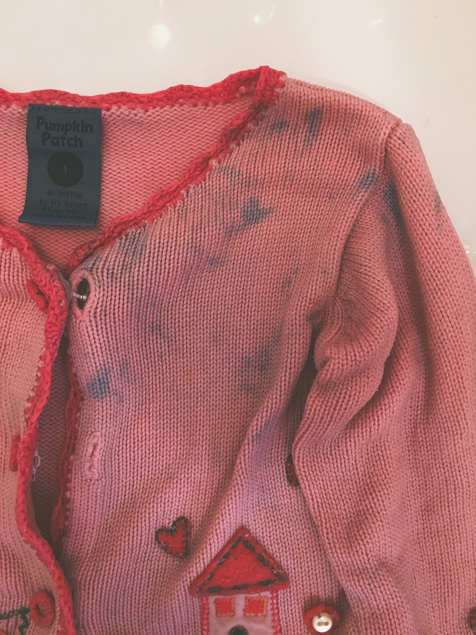 stained cardigan